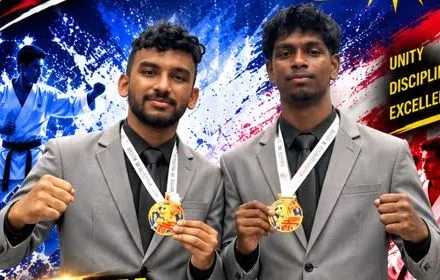 Master Navinessan Vickneswaran and Master Derren Nagenthiran with their gold medals