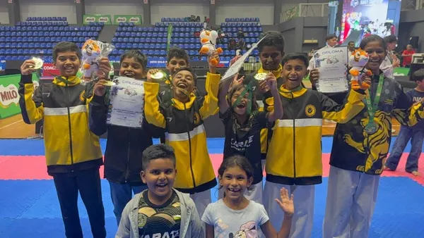 Perak Legends team celebrating with their medals and certificates